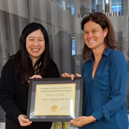 Christine receiving her award.