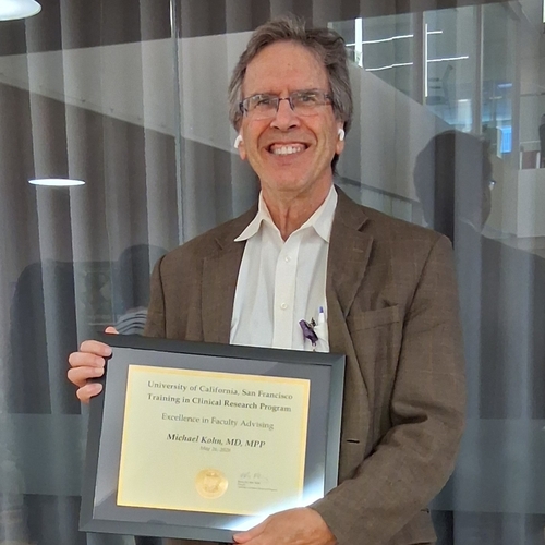 Michael receiving his award