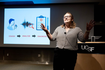 a student presenting slides